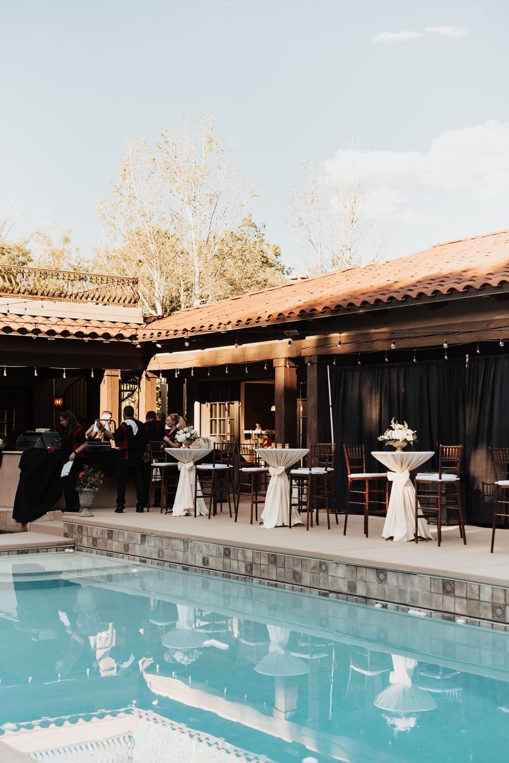 Real Albuquerque-area wedding reception at a poolside adobe venue